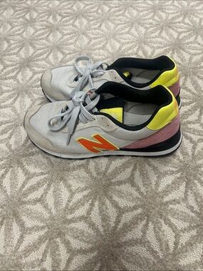 New Balance Gray Sneakers with Yellow & Pink Accents